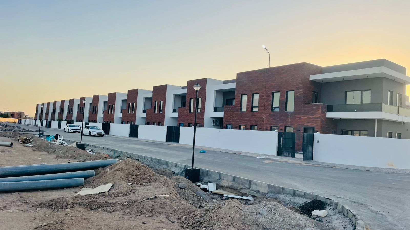 Residential units beside excavation and utility works