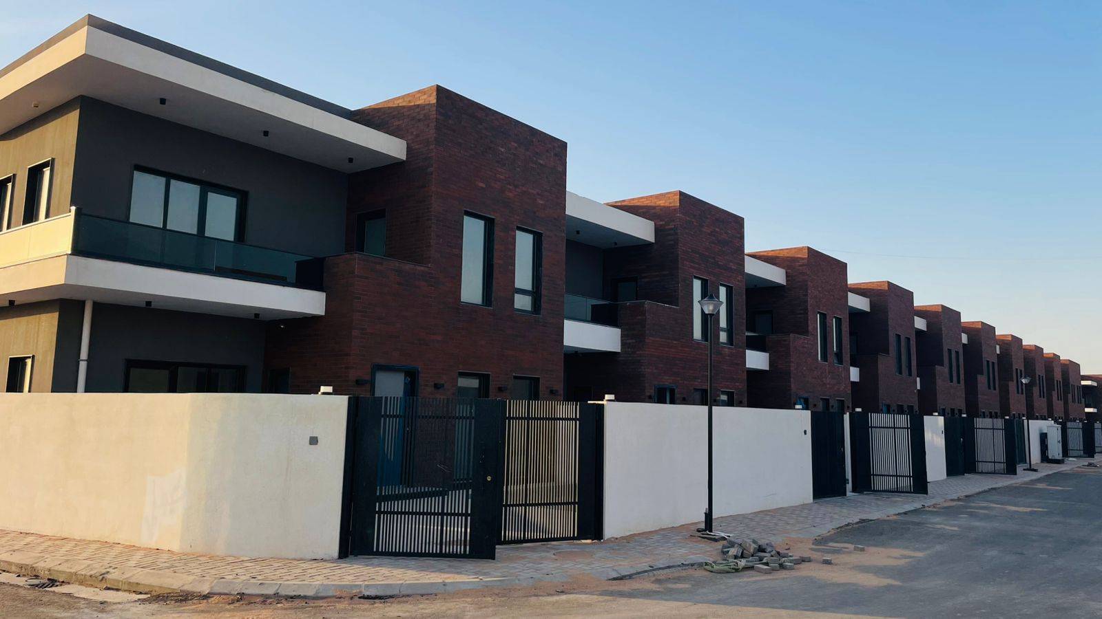 Residential units with brick facades and balconies