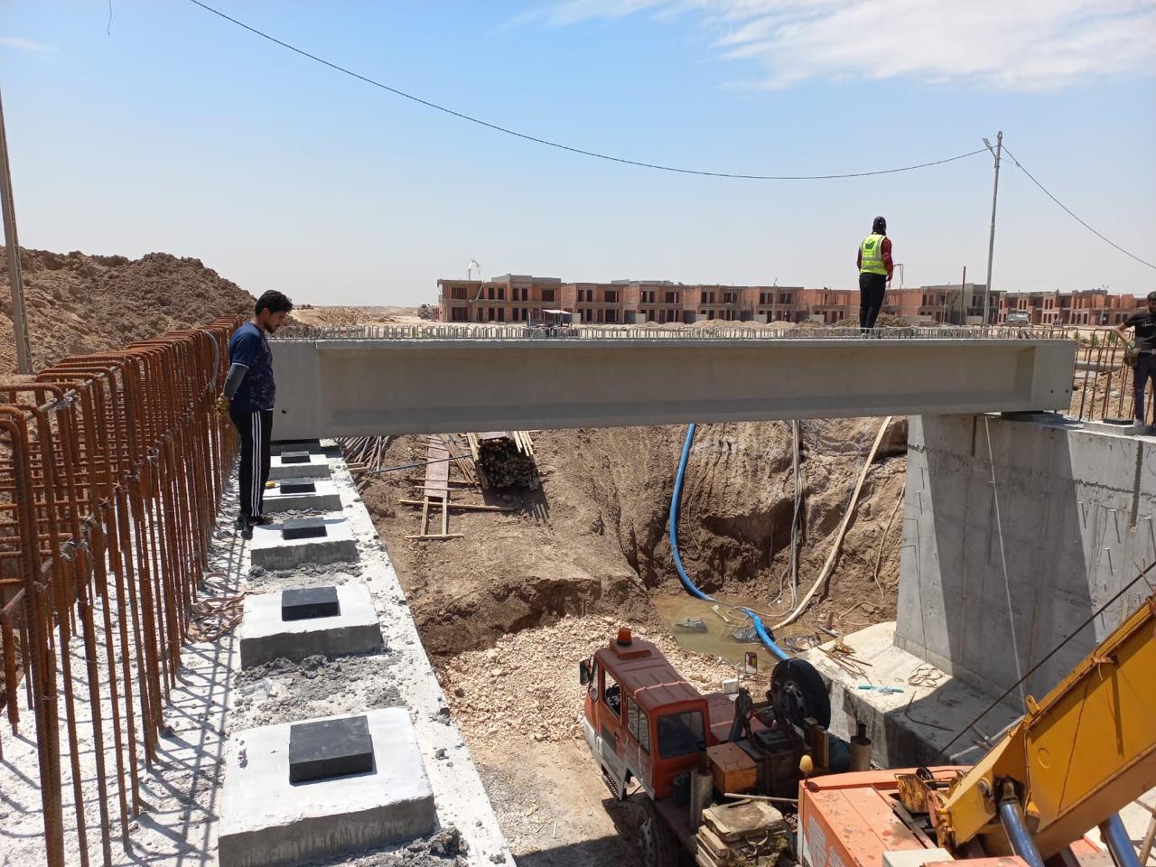 Concrete bridge girder installed between structural supports